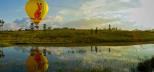 Cairns-Tour-Hot-Air-Balloon-Flying-over-Lake